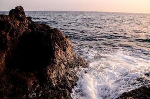 Rocks by the ocean photo