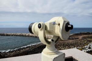 Public binoculars bu the ocean photo