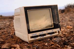 Old television on the ground photo