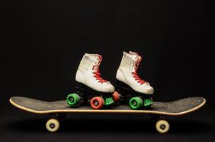 Skateboard on black background photo