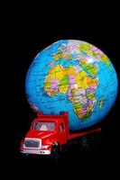 Toy truck with a globe photo