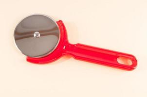 Isolated pizza cutter photo