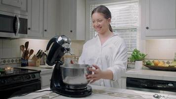 Woman Setting up an Electric Mixer video