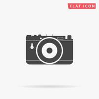 Photo camera. Simple flat black symbol with shadow on white background. Vector illustration pictogram