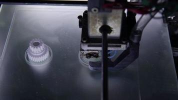 3D printer in process printing an object. video