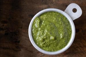 Basil Pesto in a Measuring Cup photo