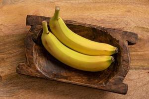 Bananas in a Wood Bowl photo