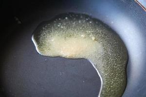 homemade ghee in container on a table , photo