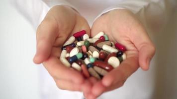 Close up of doctor hands displaying medication video
