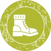 icono de vector de botas