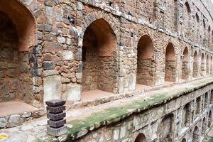 Agrasen Ki Baoli Step Well situated in the middle of Connaught placed New Delhi India, Old Ancient archaeology Construction photo