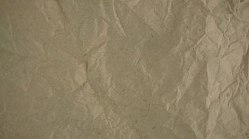 Rotating Brown Crumpled Paper Texture Background Video