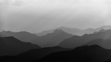 A sea of mountains in black and white photo
