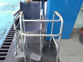 Wheelchair, a chair with wheels for disability people and hospital illness injury patient care. photo