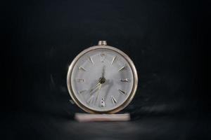 Antique vintage table clock. With blur effect