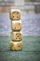 Big dice of wood. stacked one on top of another photo