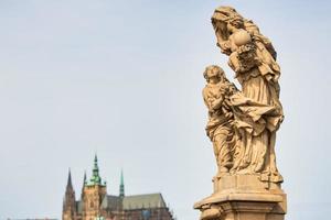 Statue on the Charles Bridge in Prague photo
