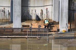 Worker at work on a construction site photo