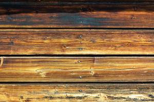 Texture of antique larch wood planks in a background image photo