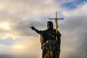 Historic Jesus on the old Prague Cemetery, Czech Republic photo