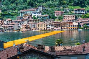 The floating piers. The artist Christo walkway on Lake Iseo photo