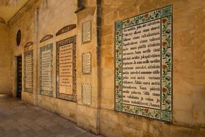 Text of the Pater Noster prayer different languageson in the Church of the Pater Noster on Mount of Olives. Israel photo
