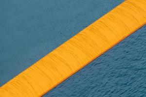 The floating piers. The artist Christo walkway on Lake Iseo photo