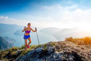 Trail running in the mountains girl athlete photo