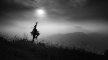 Woman freedom in nature, black and white image photo