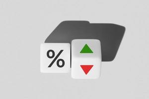 concepto de tasa de interés y tasas hipotecarias. símbolo de porcentaje de icono y dirección de flecha hacia arriba y hacia abajo en bloques de cubo foto