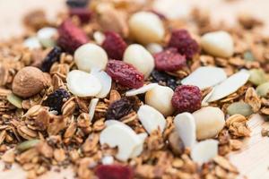 Closed up and blur breakfast healthy food, granola, musli, Organic oat, super food with honey, dried fruits and nuts photo