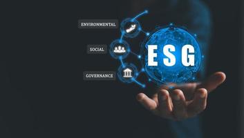 ESG environmental social governance business strategy investing concept. Ethical sustainable business on Network connection on dark background. Ideas for production and conservation of environment. photo