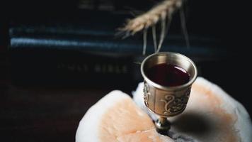 Concept of Eucharist or holy communion of Christianity. Eucharist is sacrament instituted by Jesus. during last supper with disciples. Bread and wine is body and blood of Jesus Christ of Christians. photo