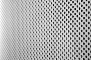 Metal Texture with Many Tiny Round Wholes photo