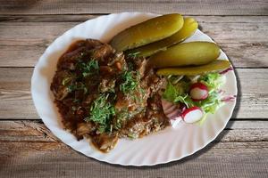 Goulash with Buckwheat and Pickles photo
