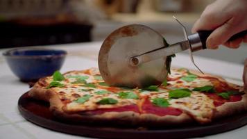 Cutting Pizza With a Pizza Cutter video