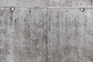 Weathered Concrete Wall with Technological Wholes - Dot Pattern photo