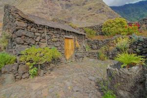 Stone house on the mountains photo