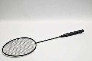 Vintage tennis racket on white background photo