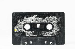 Old cassette tape on white background photo