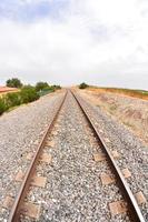 Scenic view with train tracks photo