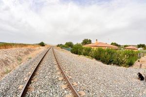 Scenic view with train tracks photo