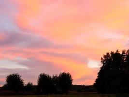 Landscape over the sunset photo