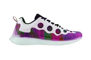 Multicolored creative sneaker on a white background. Bright joyful shoes. photo