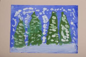 Children's Christmas drawing. Application of children's creativity. Kindergarten and craft school. The child drew a winter forest and Christmas trees. photo