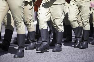 Russian soldiers in tarpaulin boots march in the ranks. photo