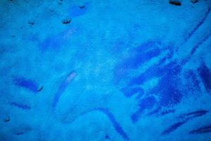 Background of blue scattered sand.Colorful sand and colored powder. photo