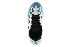 Blue sneakers with black inserts isolated on white background. photo