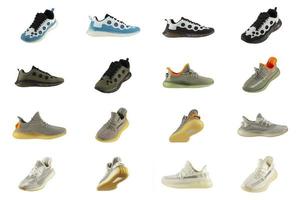 Sneakers collage. Variations of sneakers isolated on white background. photo