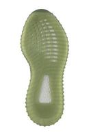 The polyurethane sole of the shoe is green with white stripes. photo